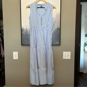 Women’s long blue and white striped dress.